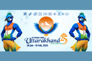 Official banner of the 38th National Games 2025 in Uttarakhand, featuring the event logo and two vibrant peacock mascots.